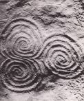 carved spirals in rock
